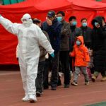 China registra 11 positivos por coronavirus, 2 de ellos por contagio local mundo