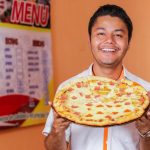 Masa + tomate + amor = Familys Pizza nicaragua