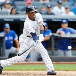Yanquis vapulean 10-2 a Azulejos, Happ sigue invicto con NY happ