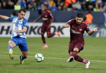 Barcelona gana en Málaga sin Messi y acelera por la liga