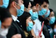 China necesita «urgentemente» mascarillas para frenar epidemia oms