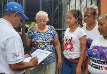 Familias del Distrito III de Managua reciben sus títulos de propiedad nicaragua