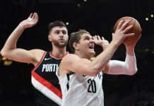 Russell anota 21 puntos y los Nets vencen a Portland 101-97