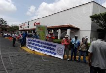 Notifican a cambistas desalojar parqueo de Supermercado La Colonia