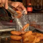 Ofertan deliciosos buñuelos leoneses en parque de ferias