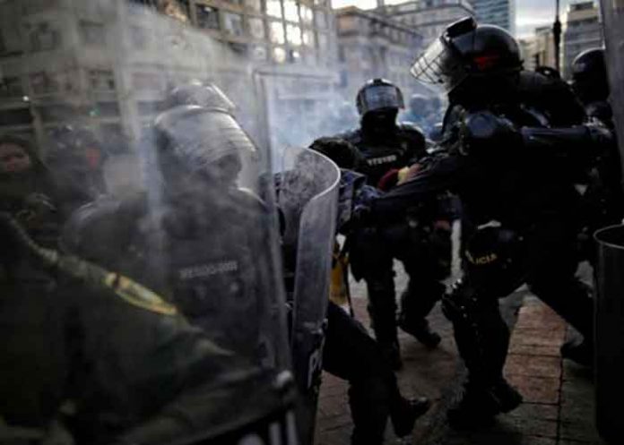 Colombia, Yumbo, desaparición de mujer, policía,