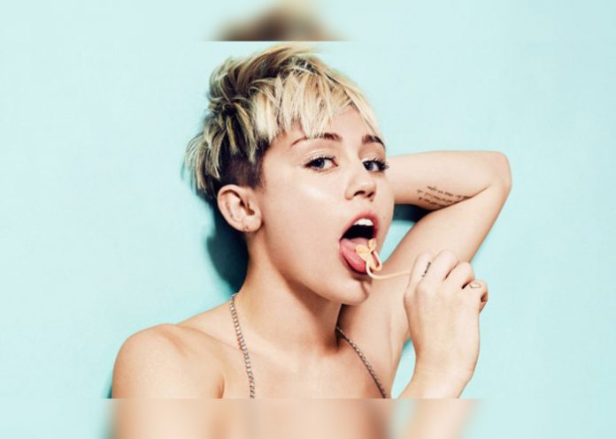 cyrus-tatu-portada