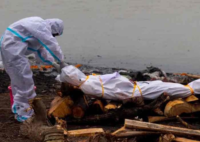 india, rio ganges, covid-19, cadaveres,