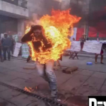 Hombre en llamas en avenida del centro de Washington