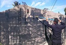 Jornada de borrado de grafitis pandilleriles en El Salvador