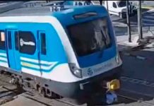 Argentina, vias de un tren , adolescente, rescate