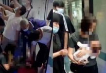 China, Wuhan, vías de metro, bebé