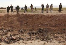 Hallan en Irak fosa común con 18 cuerpos