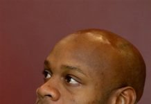 Asafa Powell gana con baño en Brasil