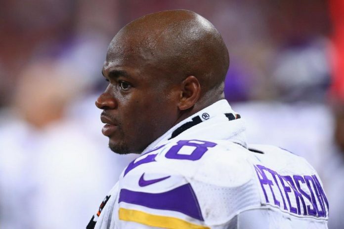 images_SECCIONES_PAGINA_WEB_8Deportivo_2014_Septiembre_08_AL_14_petersonel-corredor-vikings-adrian-peterson-acusado-l-L-sKu_i2
