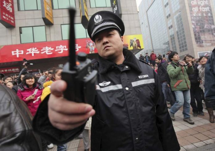 images_SECCIONES_PAGINA_WEB_CRONICATN8_INTERNACIONALES_2014_Febrero_DEL_17_AL_23_policiaschina17