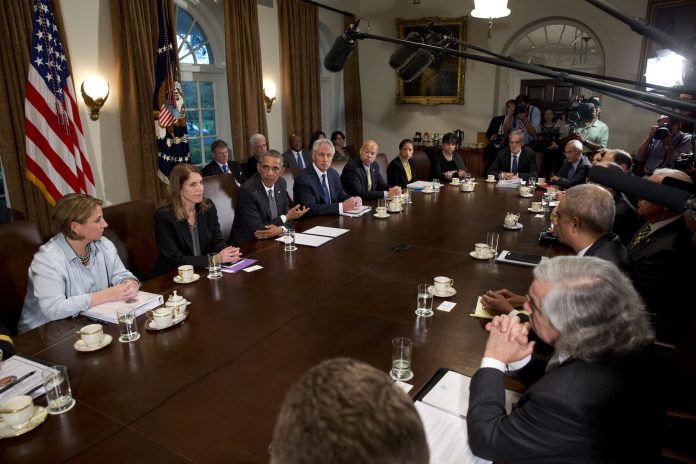 Barack Obama, Lisa Monaco, Sylvia Burwell, Chuck Hagel, Jeh Johnson, Susan Rice, Penny Pritzker, Denis McDonough