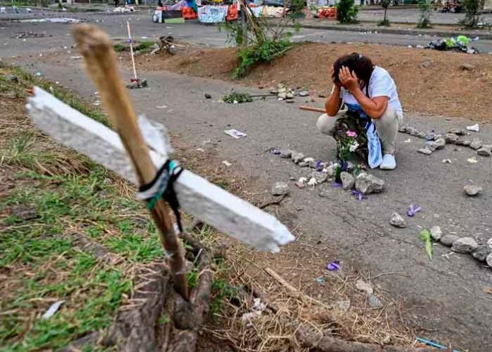 colombia, reporte, asesinato, manifestantes, cali,
