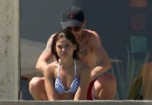 Novia de Louis Tomlinson hace atrevido topless