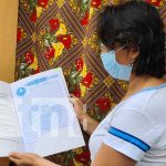 Familias del barrio Oro Verde, Ciudad Sandino, con títulos de propiedad nicaragua, titulo de propiedad, ciudad sandino, seguridad juridica,