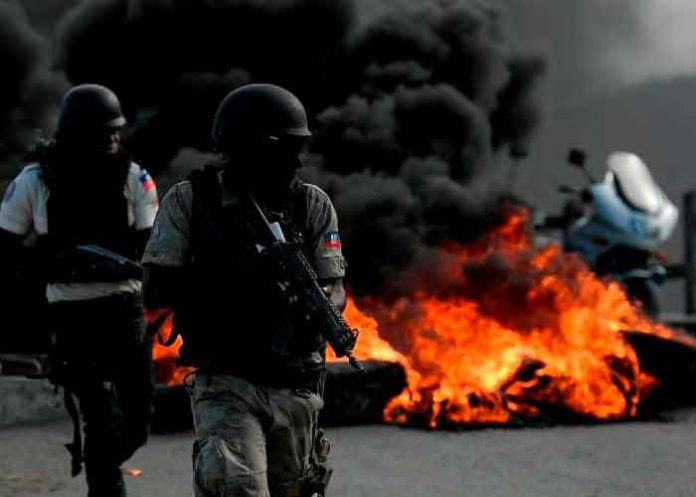 Foto: Protestas violentas ensombrece misa en memoria de Moïse/Cortesía