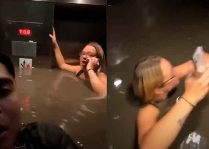 VIDEO: Quedan atrapados dentro de un ascensor con el agua hasta el cuello / FOTO / Youtube