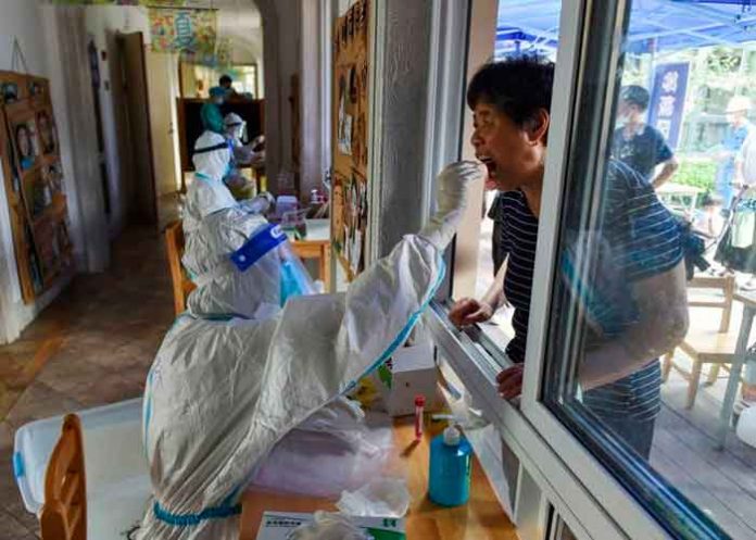 China suspende viajes al extranjero para frenar brotes la cepa Delta