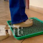 Loto Nicaragua fortalece medidas sanitarias para prevenir el COVID-19 Persona aplicando medidas sanitarias en Loto Nicaragua