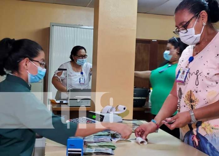 Pago a trabajadores del Estado con aumento salarial