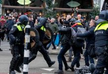 Protestas contra estrictas restricciones sanitarias en Países Bajos Protesta en Países Bajos por medidas estrictas sanitarias