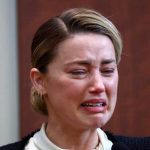 Reacción de Amber Heard al verse tan cerca de Johnny Depp