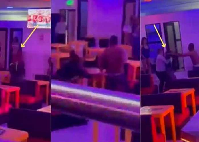 En video: Mujer saca a su esposo de un prostíbulo 'casi desnudo'