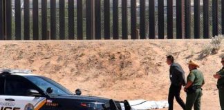Buscando el sueño cae del muro fronterizo y muere 