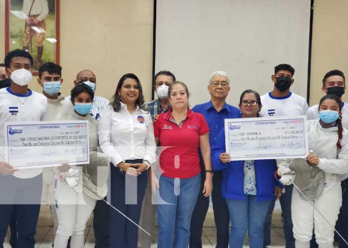 LOTERIA-1 Lotería Nacional realiza entrega de utilidades al IND y MIFAMILIA