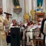 Padre se la rifa al cantar “Mi razón de ser” de Banda MS