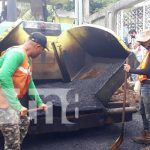 Cuatro cuadras de revestimiento asfáltico al barrio Tierra Prometida, Managua Nuevas calles para el barrio Tierra Prometida, Managua