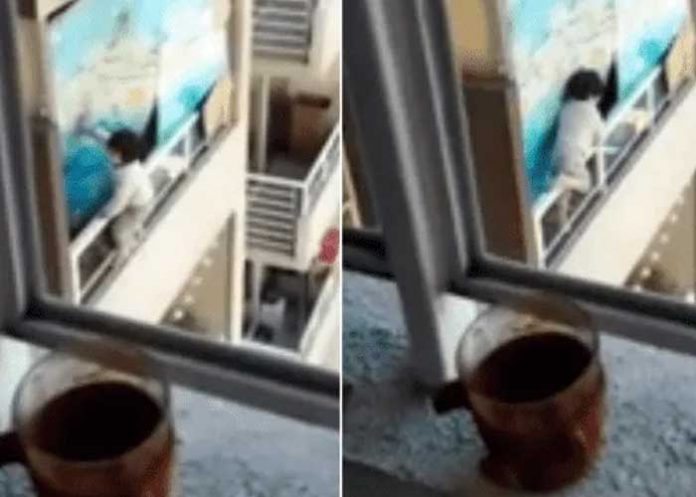 Bebé camina al borde de una ventana en edificio de 21 pisos (VIDEO)