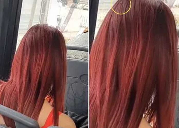 1/ Mujer es grabada con un