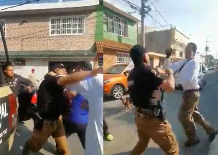 Civil se faja los pantalones con policía y se dan tremenda 
