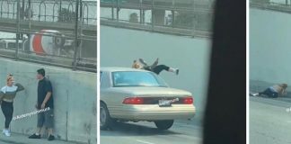 Mujer se arroja a los carros en una pelea con su marido