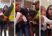 Cruelmente esposada y con niña en brazos por pedir liquidación en Colombia En Colombia termina esposada por pedir liquidación