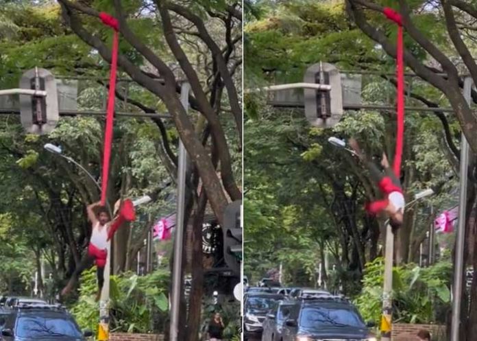 Hace danza aérea en semáforo para poder ganarse la comida diaria