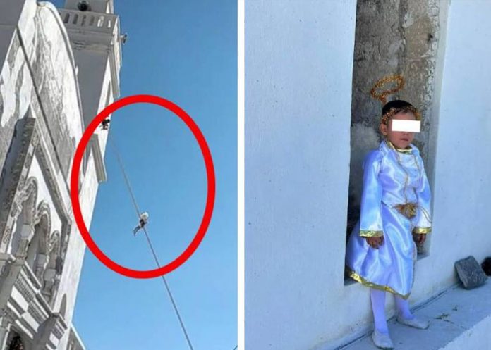 1 ¡De película! Niño vestido de ángel es bajado de una torre (Video)