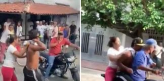 ¡VIDEO! A manotazos llegó a sacar una madre a su hijo de una protesta