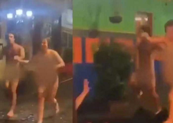 ¡De locos! Pareja de extranjeros corren en “pelotas” en calles de Colombia