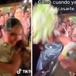Casi se le rompe el brazo por pelear el ramo de flores en una boda