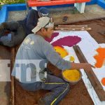 Tradicionales alfombras pasionarias se exhiben en el Puerto Salvador Allende