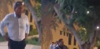 Padre furioso retira a fajazos a su hijo de una posta