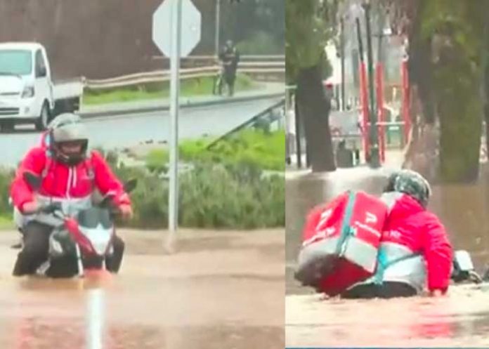 Repartidor de comida es arrastrado con su moto 