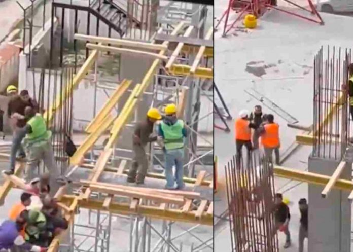 Albañiles se enfrentan en lo alto y esto pasó